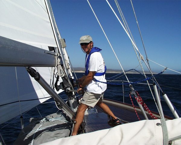 Karl Buhl reefing the mainsail, Sea of Cortez, December, 1999